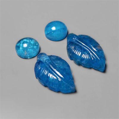 Crystal With Neon Apatite Doublets And Leaf Carving Set